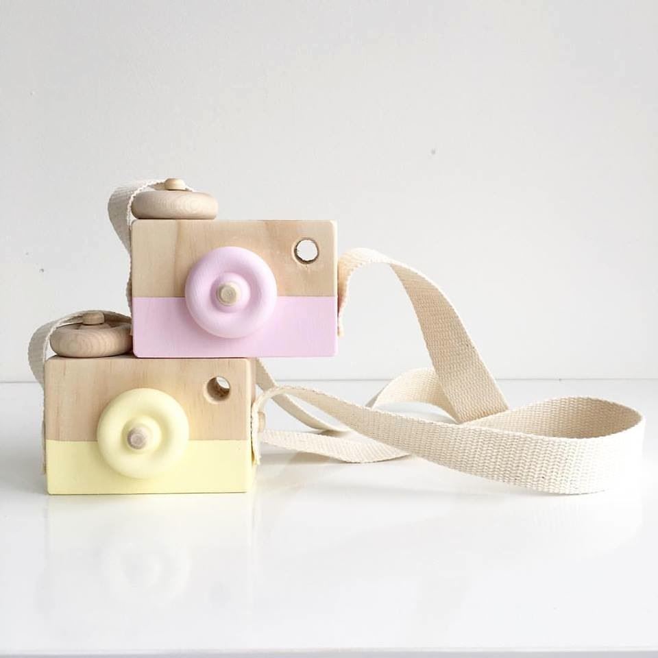 behind-the-trees-wooden-camera-pastel-kids-decor